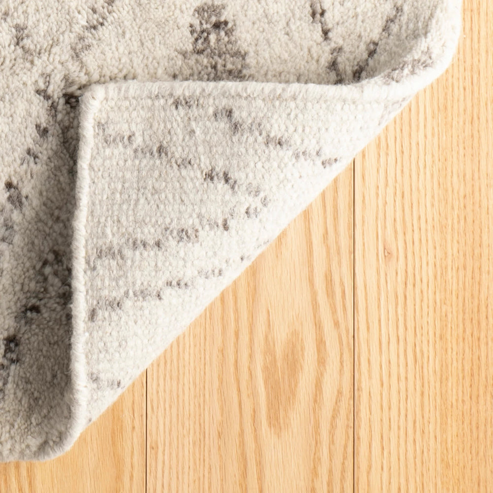 Masinissa Hand Knotted Wool Rug | Natural